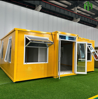 Maison conteneur de luxe extensible, maison modulaire préfabriquée moderne avec conception à double aile pour habitation résidentielle