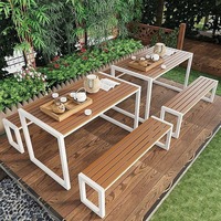 Ensemble de table et de chaises de salle à manger d'extérieur modernes et confortables de haute qualité avec fer forgé pour usage hôtelier