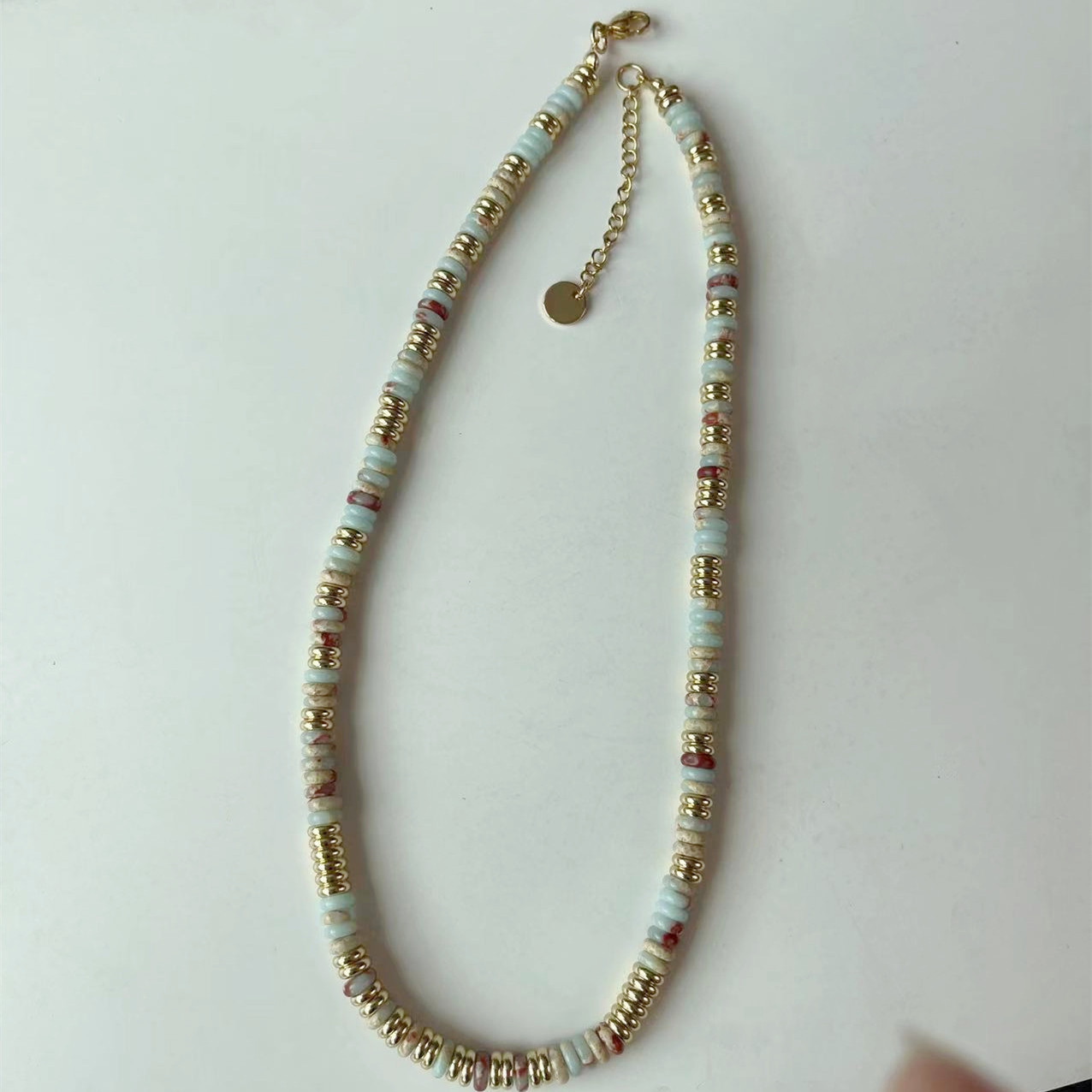 9    Snake-skin pattern flying disc necklace