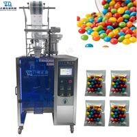 Machine d'emballage entièrement automatique à trois soudures latérales pour granulés, avec fonction de comptage des bonbons et des haricots, système de codage de date par ruban, haute performance d'emballage
