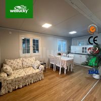 Maison conteneur préfabriquée en acier extensible de 20 pieds, moderne et mobile, 2 chambres, bureau, école, appartement, magasin, hôtel, villa, parc, construite
