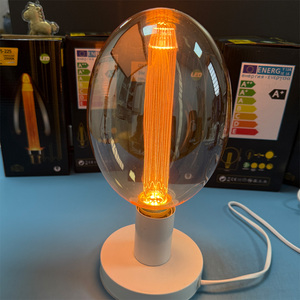 Ampoule LED à filament vintage E27 3W, verre ambré, lumière décorative Edison, 1800K blanc chaud, grande lampe ovale design - Product Image 1