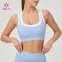 Soutien-gorge de sport côtelé personnalisé pour le yoga et la gym, maintien léger, en nylon très élastique, col en U, bordure contrastante, haut court d'entraînement
