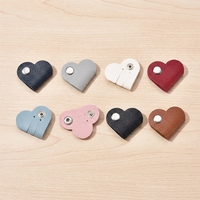 Organisateur de câbles mignon en forme de mini-cœur, support portable en cuir PU pour écouteurs, accessoire de fixation de câbles en gros pour usage quotidien