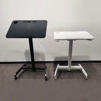 Bureau debout pneumatique à colonne unique moderne à hauteur réglable Table basse pour la maison avec roues Design à une jambe mobile