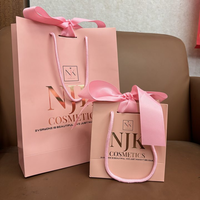Sacs cadeaux élégants personnalisables avec logo en aluminium Sac à provisions en papier de couleur pour l'artisanat de bijoux et de vêtements avec nœuds à poignée en ruban