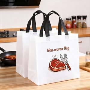 ถุงผ้าไม่ทอสีดำลายสเต็ก พร้อมหูหิ้ว สำหรับส่งอาหารกูร์เมต์ ร้านสเต็ก บริการจัดเลี้ยง ดีไซน์ใช้งานได้จริง - Product Image 1