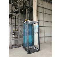 Ascenseur hydraulique compact pour villa résidentielle, design élégant, vitesse 0,4 m/s, certifié ISO9001/CE, couleur et dimensions personnalisables