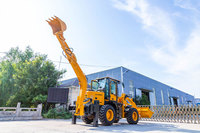 Chargeuse-pelleteuse compacte 6000 kg 4x4 avec pelle de 0,25 m³ et chargeur de 1,2 m³ pour les chantiers de construction urbains
