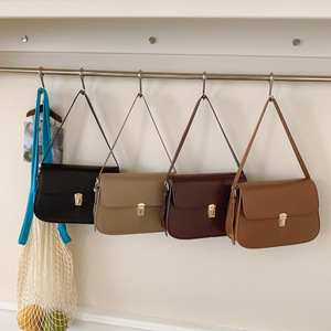 กระเป๋าสะพายไหล่ผู้หญิงสีพื้นเรียบง่ายสไตล์เรโทรใหม่ปี 2025 คุณภาพสูง แฟชั่นเกาหลี กระเป๋าใต้วงแขน ดีไซน์เฉพาะตัว สำหรับกระเป๋าทรงบาแกต - Product Image 3