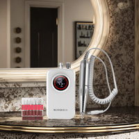 Machine à ongles professionnelle sans fil portable 50W blanche rechargeable avec moteur brossé en ABS, 45000 tr/min, kit de perceuse à ongles sans fil US