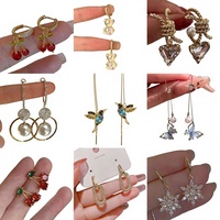Meilleures ventes transfrontalières : Boucles d'oreilles en alliage ultra-brillant avec strass, design de niche mignon, élégance haut de gamme, boucles d'oreilles en perles exquises