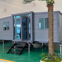 Maison conteneur extensible à double aile avec section de terrasse rétractable, cabine mobile, revêtement de sol en SPC (plastique et pierre) et étanche