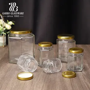 Jarra de vidrio transparente con forma hexagonal para miel, tarro de cristal con tapa dorada para almacenaje de cocina, para jalea, 50ml, 70ml, 100ml, 300ml, 750ml