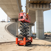 Vente directe usine : Plateforme élévatrice à ciseaux sur chenilles électrique autopropulsée 450 kg pour terrains accidentés et travaux de construction