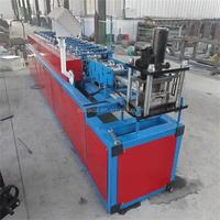 Machine de formage de tuiles à prix abordable pour profilés de volets en acier et panneaux de volets roulants avec moteur et boîte de vitesses