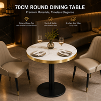 Table de bistrot ronde pour hôtel et café, plateau en pierre frittée, bord en aluminium doré, base en piédestal noir, vente en gros pour la restauration commerciale, OEM