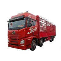 Camion de fret diesel Shacman d'occasion 30 tonnes 8x4, transmission manuelle, >450 ch, norme Euro 5, réservoir de chargement à gauche, clôture, caméra arrière