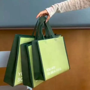 ถุงผ้า<span class=keywords><strong>กระสอบ</strong></span>ซานต้าสีเขียวทำจาก PP ไม่ทอสำหรับงานปาร์ตี้คริสต์มาสงานวันเกิดซูเปอร์มาร์เก็ต - Product Image 1