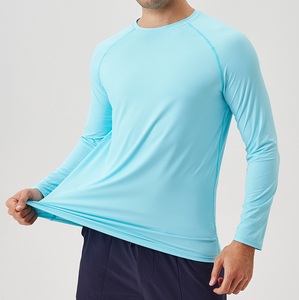 T-shirt de sport pour homme, bleu clair, manches longues, séchage rapide, coupe ajustée, col rond, tricoté, couleur unie - Product Image 1