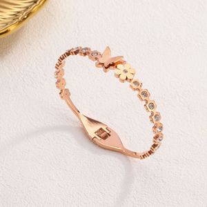 PVD 18K Gold Plated Titanium Stainless Steel Butterfly & Flower <b>Bangle</b> <b>Bracelet</b> with Spring Loaded Clasp for Women - Product Image 3
