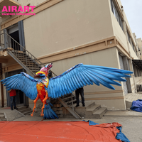 Ballon phénix de 6,5 m de large de style technologique pour la décoration de fond de scène, animaux gonflables personnalisés en forme d'oiseau phénix volant pour la musique