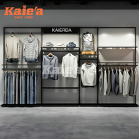Porte-vêtements de mode moderne personnalisé pour boutique de meubles de présentation de vêtements sur pied pour la conception intérieure de la boutique Trendy Mens Shop