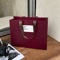 Grands sacs en papier de luxe avec impression personnalisée et poignées renforcées pour vêtements, cosmétiques et cadeaux