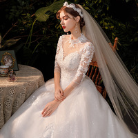 Robe de mariée de luxe personnalisée, broderie vintage, col montant, manches trois-quarts, blanche, 2026, avec traîne royale et sequins