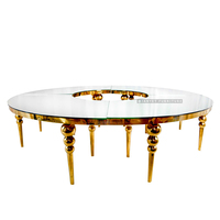 Vente en gros Table de mariage serpentine de luxe courbée en acier inoxydable à dessus blanc