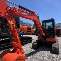 Mini-excavatrice sur chenilles Kubota U55-4 d'occasion, d'origine japonaise, 5 tonnes, avec cabine complète et lame de bulldozer, faible nombre d'heures de travail