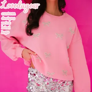 洛芙达ODM OEM时尚圆领长袖设计师服装粉色蝴蝶结装饰串珠女式运动衫