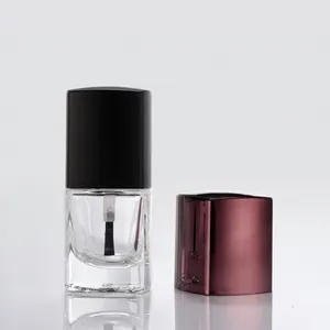 Black square nail polish bottle cap with brush