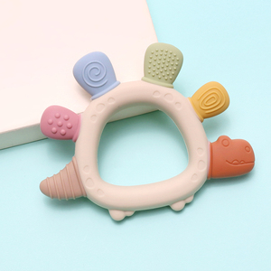 Bán buôn Silicone bé mọc răng vòng phim hoạt hình khủng long phong cách bé Teether sản phẩm đồ chơi cấp thực phẩm Silicone bé nhai Đồ chơi thiết lập - Product Image 2