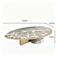 Table basse en marbre de forme elliptique libre, combinaison de cylindre en marbre et base en support doré, mobilier de salon de luxe de designer