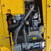 Excavatrice Komatsu PC130-7 d'occasion, modèle 2021, capacité de la benne de 0,5 m³, poids opérationnel de 13 tonnes, à vendre
