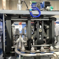 Máquina de Moldeo por Soplado de PET TURBO-2L 2400BPH de Alta Calidad, Totalmente Automática, de 2 Cavidades, Fabricada en China para la Producción de Botellas de Plástico