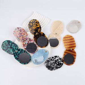 Peigne miroir pliable multifonctionnel pour filles, portable, antistatique, en acétate, avec texture marbrée - Product Image 1