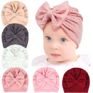 Nouveau chapeau jacquard à nœud pour bébé chapeau fin pour fille chapeau fœtal désossé pour bébé bonnet élastique côtelé pour nouveau-né de couleur pure vente en gros
