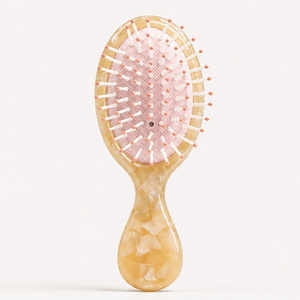 Peigne à cheveux en acétate de cellulose de qualité supérieure OEM ODM avec poils de sanglier naturels et coussin d'air flexible pour les soins capillaires quotidiens - Product Image 1