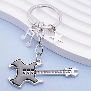 Nuevo llavero de guitarra musical de dos tonos con colgante de pentagrama para bolsos y llaves de coche - Product Image 4