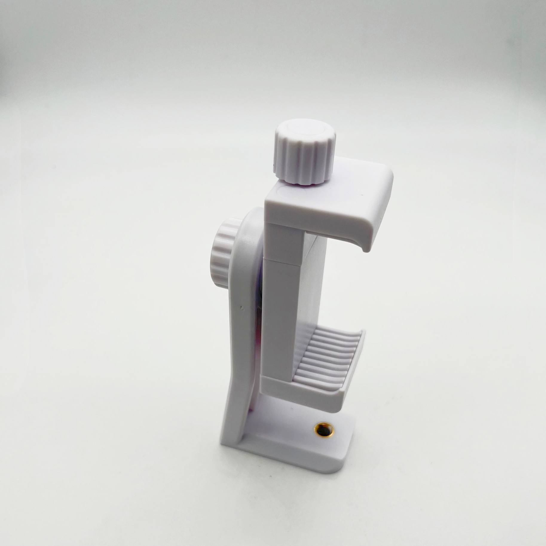 คลิปหนีบโทรศัพท์สีขาวสำหรับถ่ายภาพทั้งแนวนอนและแนวตั้ง