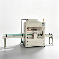 Machine de remplissage automatique de liquides haute précision pour bouteilles en plastique/verre de 200 ml, résistante à la corrosion, à buses multiples industrielles
