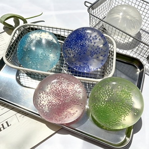 Balle anti-stress transparente et souple avec billes, jouet sensoriel en TPR, balle à presser unisexe, balle anti-stress moulable à l'huile de coco - Product Image 1