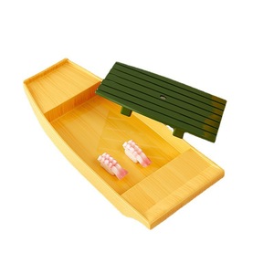 A Japanese dragon <b>boat</b>-style sashimi and sushi platter served with shaved ice, beautifully presented with hotel Japanese - Product Image 5