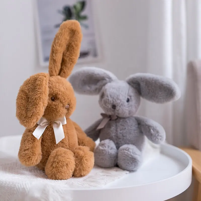 DOULUO fabrika kaliteli özelleştirilmiş boyutu renk güzel utangaç dolması Bashful bej Bunny Lop tavşan peluş oyuncaklar bebekler
