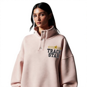 Sudadera oversize rosa con cuello simulado para mujer, con cierre de botones y estampado gráfico de estrellas de Trackstar, estilo streetwear cómodo. - Product Image 1