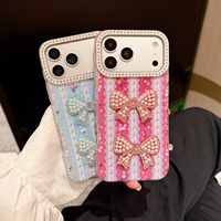 Coque de téléphone rigide magnétique en TPU mat effet premium avec strass en forme de cœur et nœud, ornée de perles de style nouveau pour iPhone 18