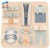 Tableau d'activités en bois pour enfants avec fermetures éclair, boucles, lacets et boutons-pression – Jouet éducatif pour l'apprentissage des compétences de vie W12L006B