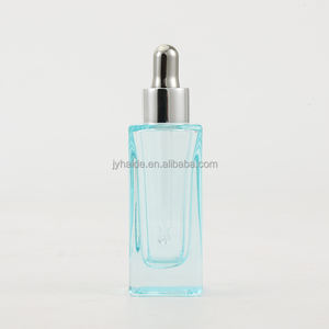 ขวดแก้วหยดน้ำสีฟ้าขวดแก้วทรงสี่เหลี่ยมหรูหราขนาด30มล. - Product Image 1